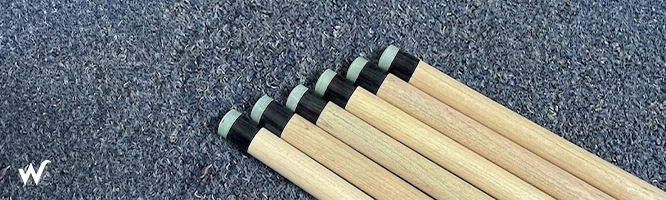 close-up of solid wood pool cue shaft